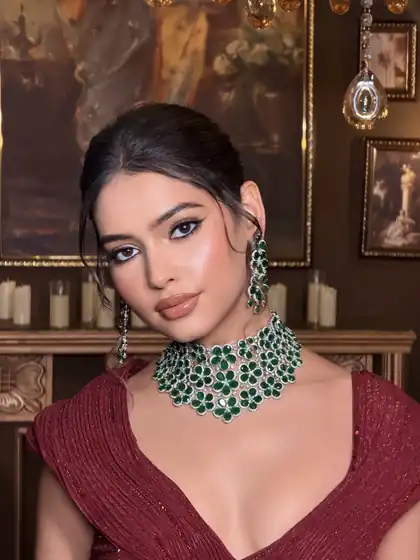 Emerald bridal look in deep wine
