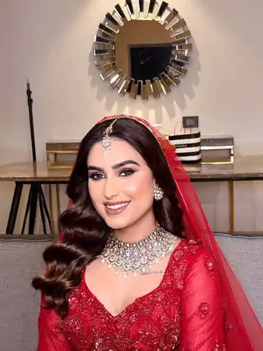Red bridal look with veil